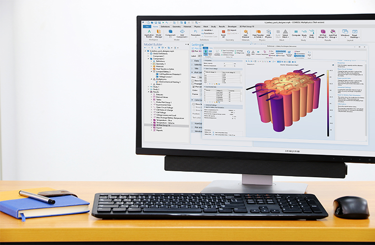 A desktop computer showing the COMSOL Multiphysics UI with a battery pack model in the Graphics window.