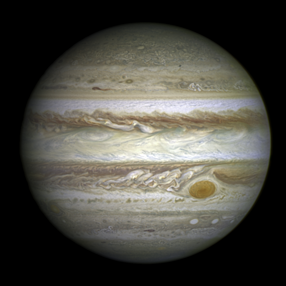 木星照片，右下角的大红斑周围有漩涡。