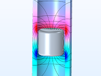 A detailed view of a magnet falling through a copper tube.