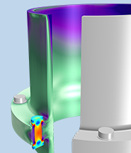 管子连接模型的特写视图，显示了彩虹颜色表中螺栓处的应力。