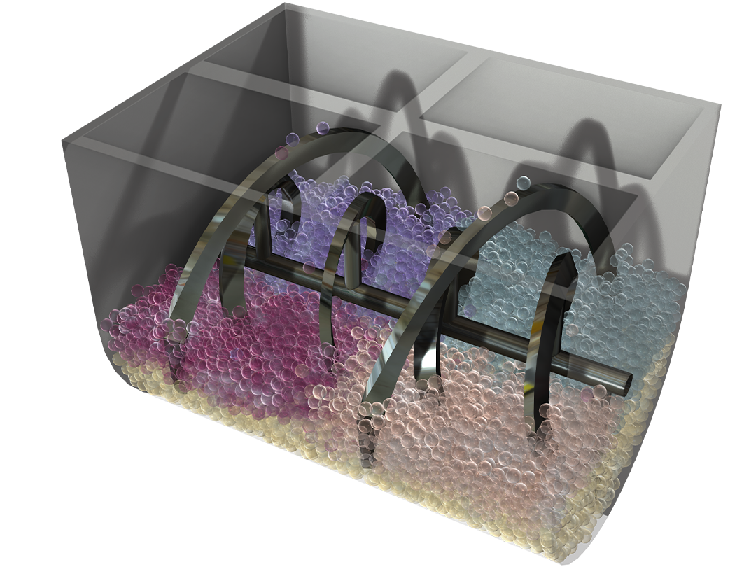 Ein Modell eines Bandmischers, gefüllt mit Körnern in fünf verschiedenen Farben.