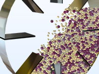 Detailansicht eines rotierenden Trommelmodells während des Mischvorgangs von Körnern.