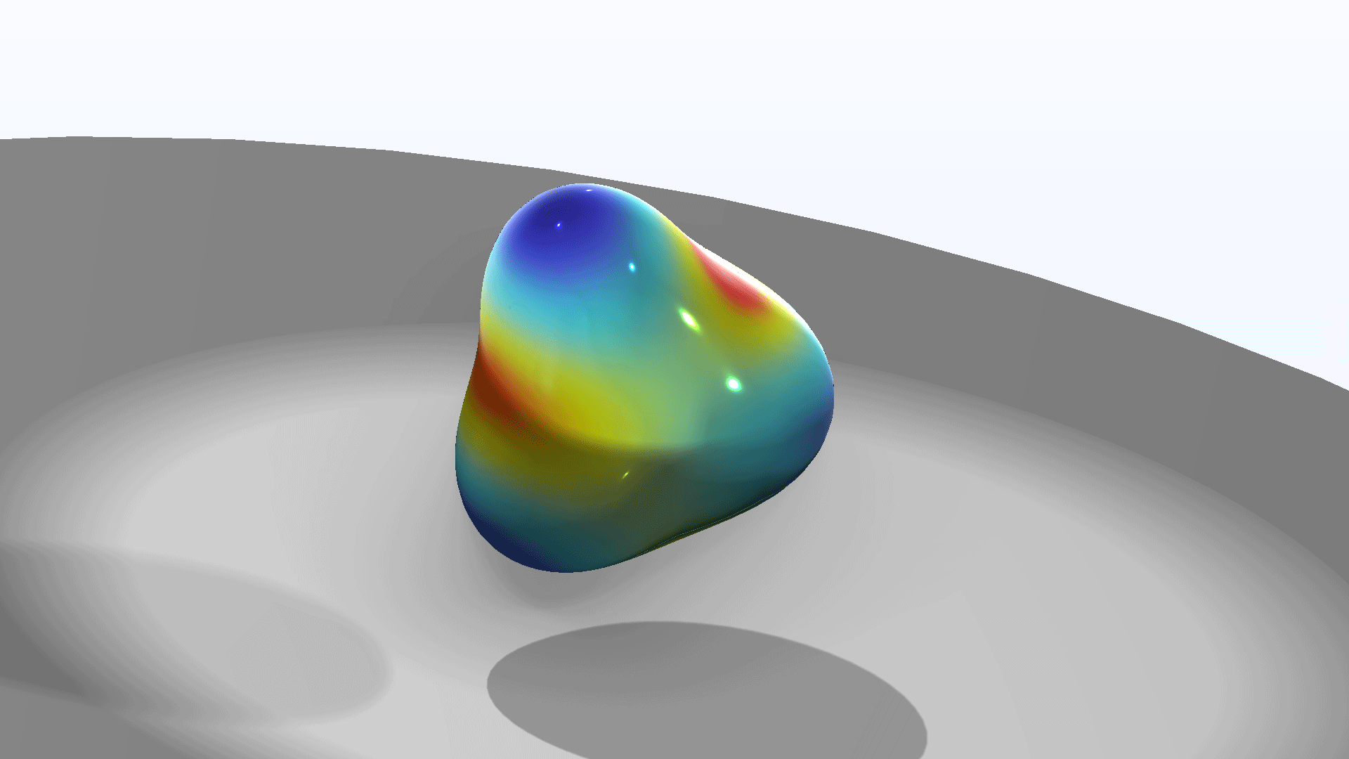 A micro air bubble model showing the eigenmodes and eigenfrequencies in the Rainbow color table.