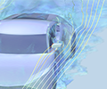 A sports car model with the flow field visualized in blue and yellow streamlines.