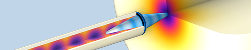 A crayon-shaped probe that is partially cut out to reveal the inside and the tip in contact with a generic visualization of tissue.