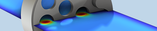 The geometry of a hearing aid wax guard with acoustics modeled in rainbow.