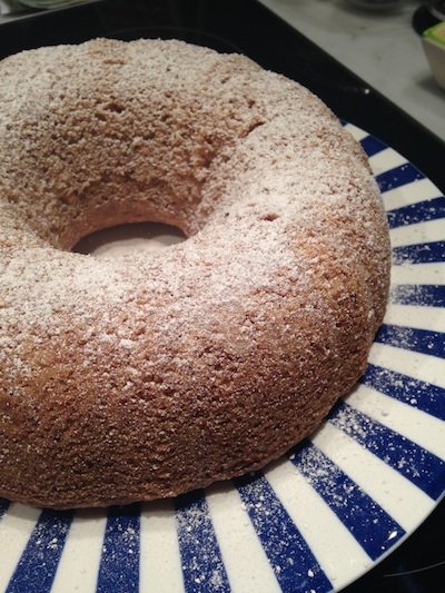 Photo of a low-fat vegan bundt cake with powdered sugar.