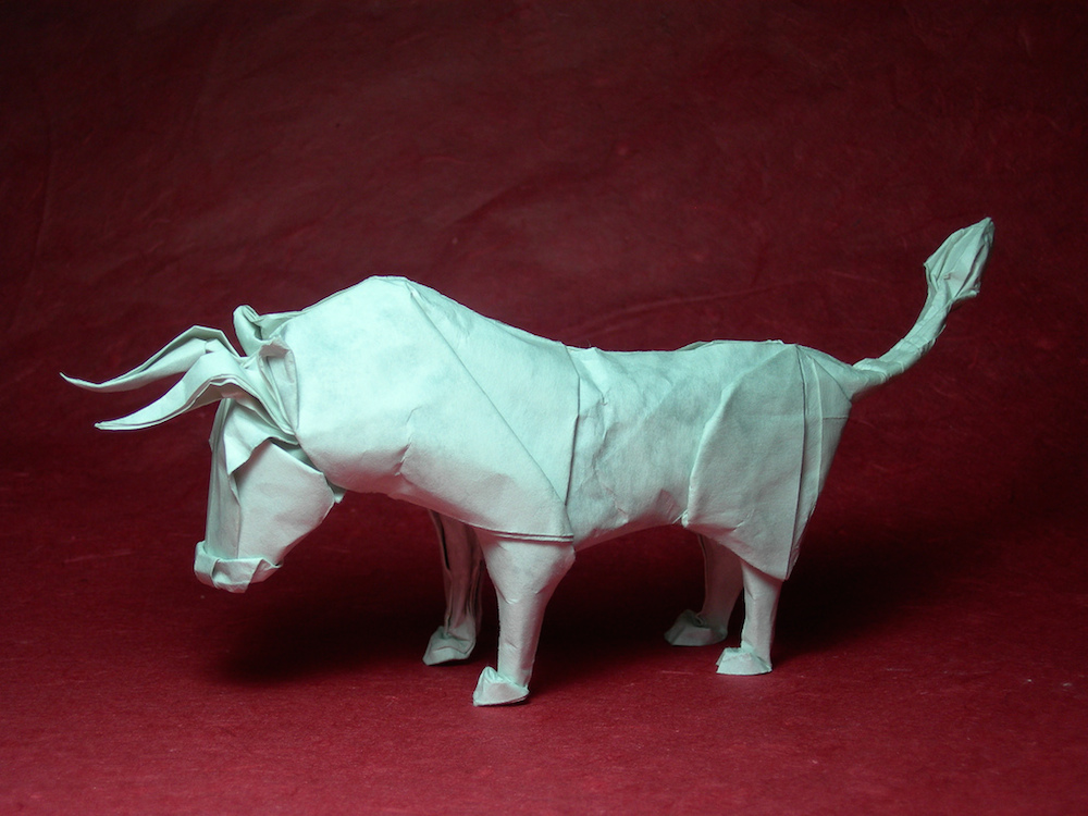 Photo of a wet-folded origami bull.