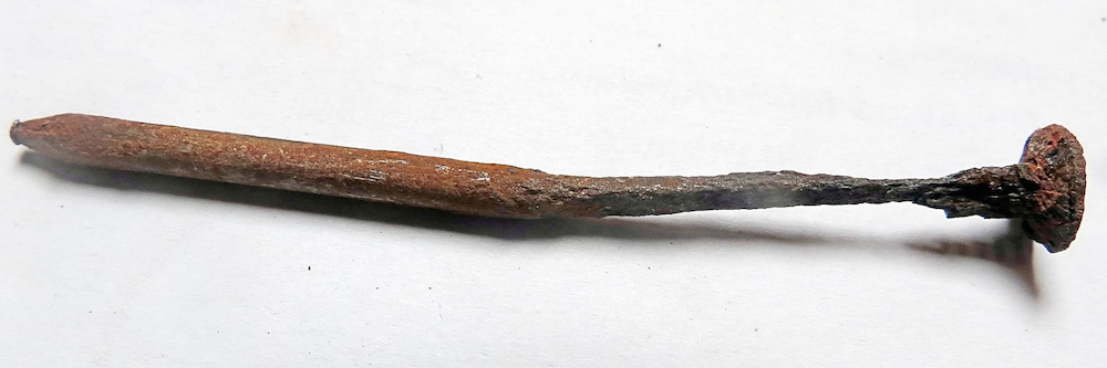 The results of atmospheric corrosion on a nail.