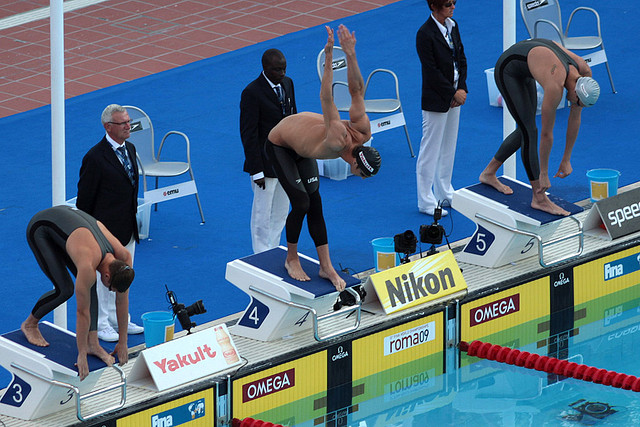 Swimmers preparing to compete.