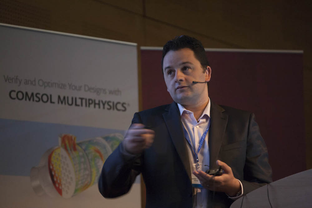 A photograph of Sébastien Cambon at the COMSOL Conference 2015 Grenoble.