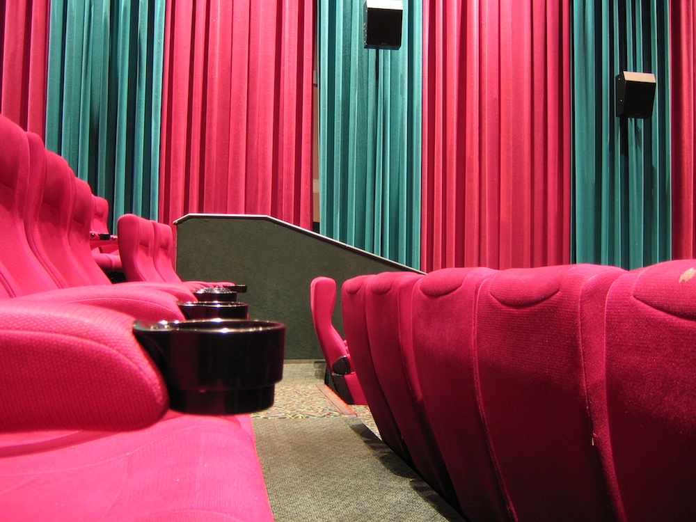 Image depicting loudspeakers in a movie theater.