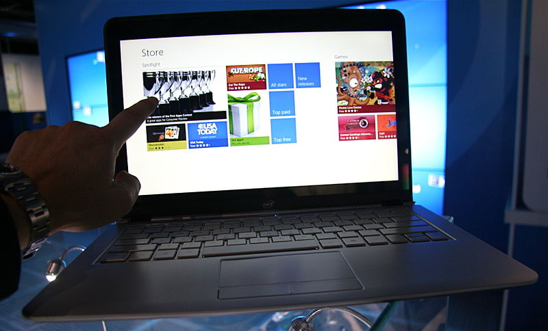 A photograph of a touchscreen laptop.