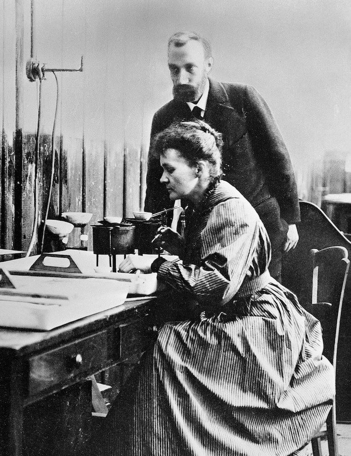 Pierre and Marie Curie at work.