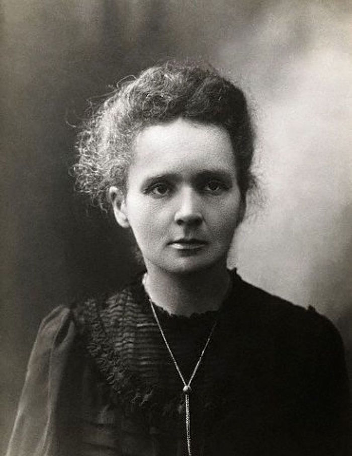 A photograph of Marie Curie.