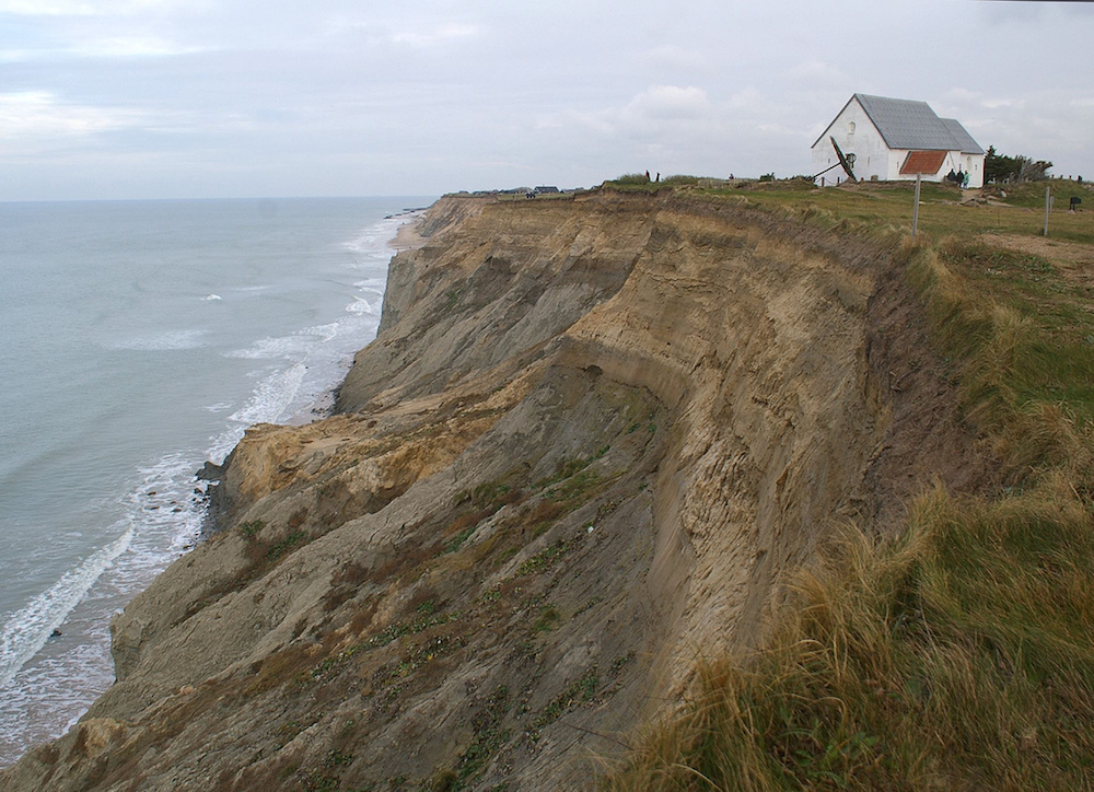 A photograph of an eroded shoreline.