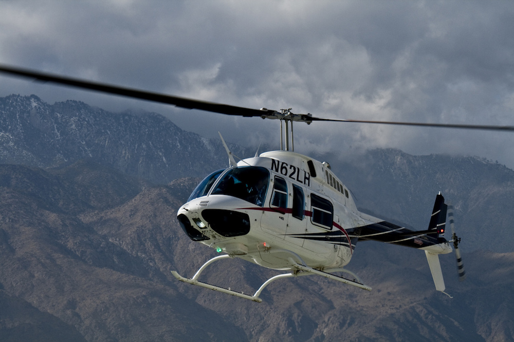 A photo of a helicopter midair.