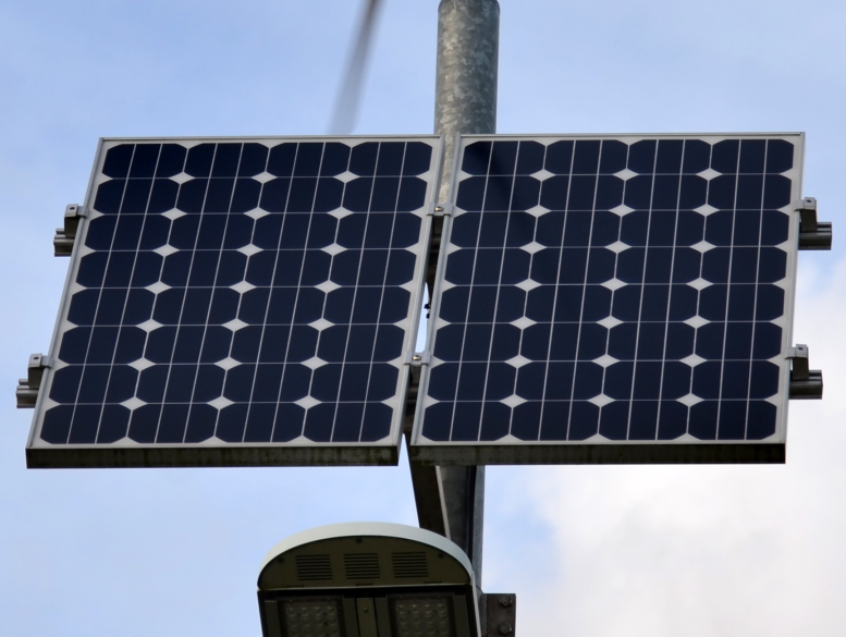 A photograph of a solar panel made up of silicon solar cells.