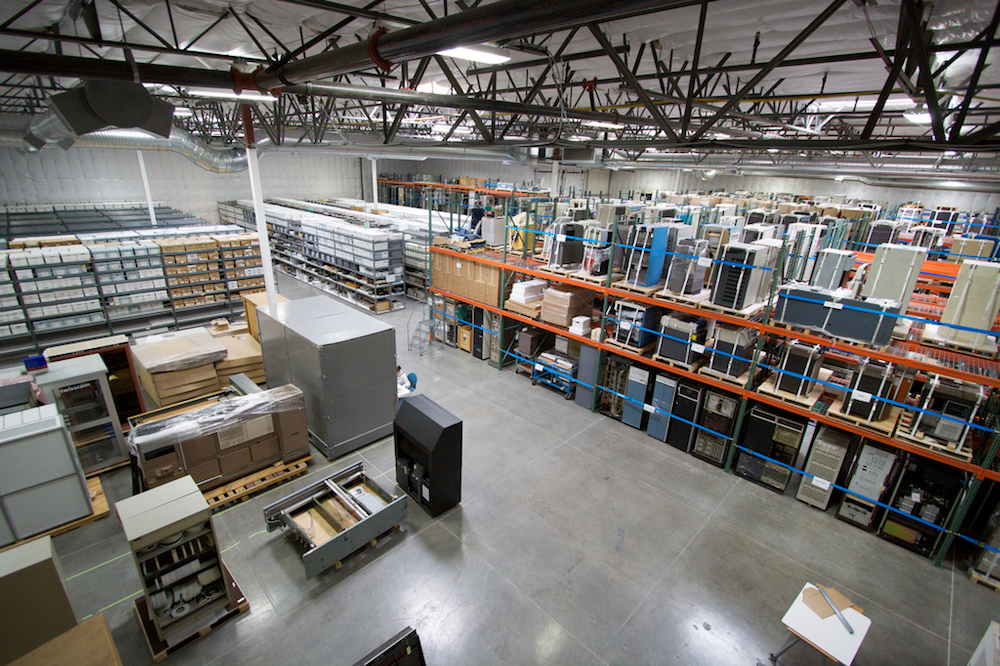 A photograph of a warehouse, which can benefit from wireless power transfer through QSCR.