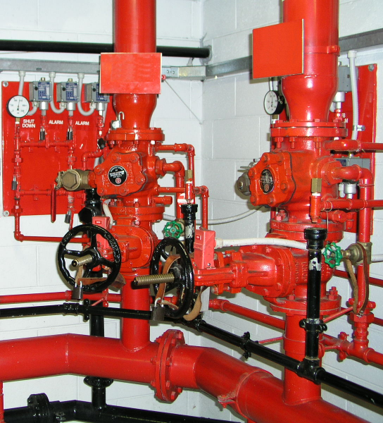 A photograph of a system of threaded pipes.