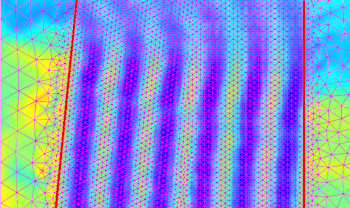 COMSOL Multiphysics mesh for the beat wavelength inside a lens featured