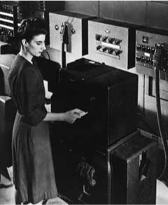 A photo of Frances Spence working on ENIAC.