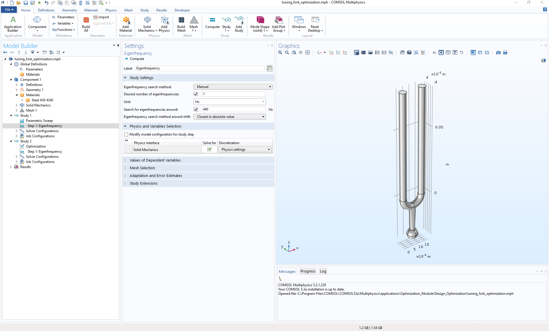 A screenshot of the COMSOL Multiphysics GUI with a tuning fork model in the Graphics window.