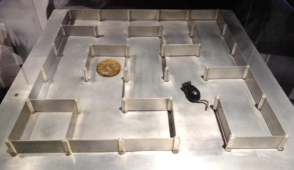 A photo of Shannon's maze with a magnetic mouse.