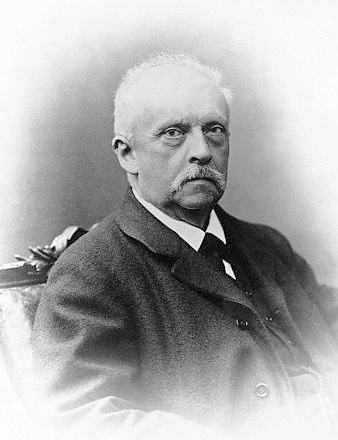 A portrait of Hermann von Helmholtz in black and white.