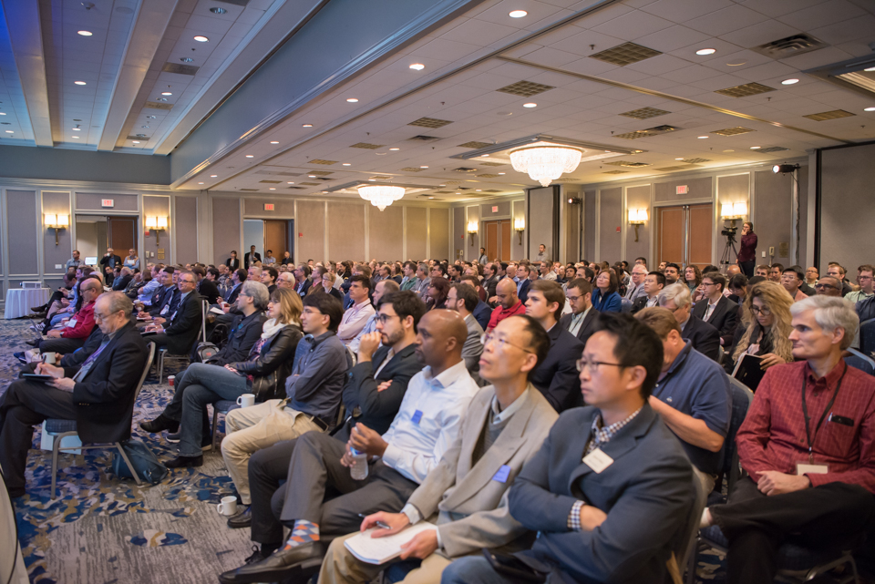 A photograph of COMSOL Conference 2018 Boston attendees watching a presentation.