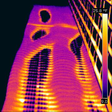 A thermal photograph of an insulated building envelope.