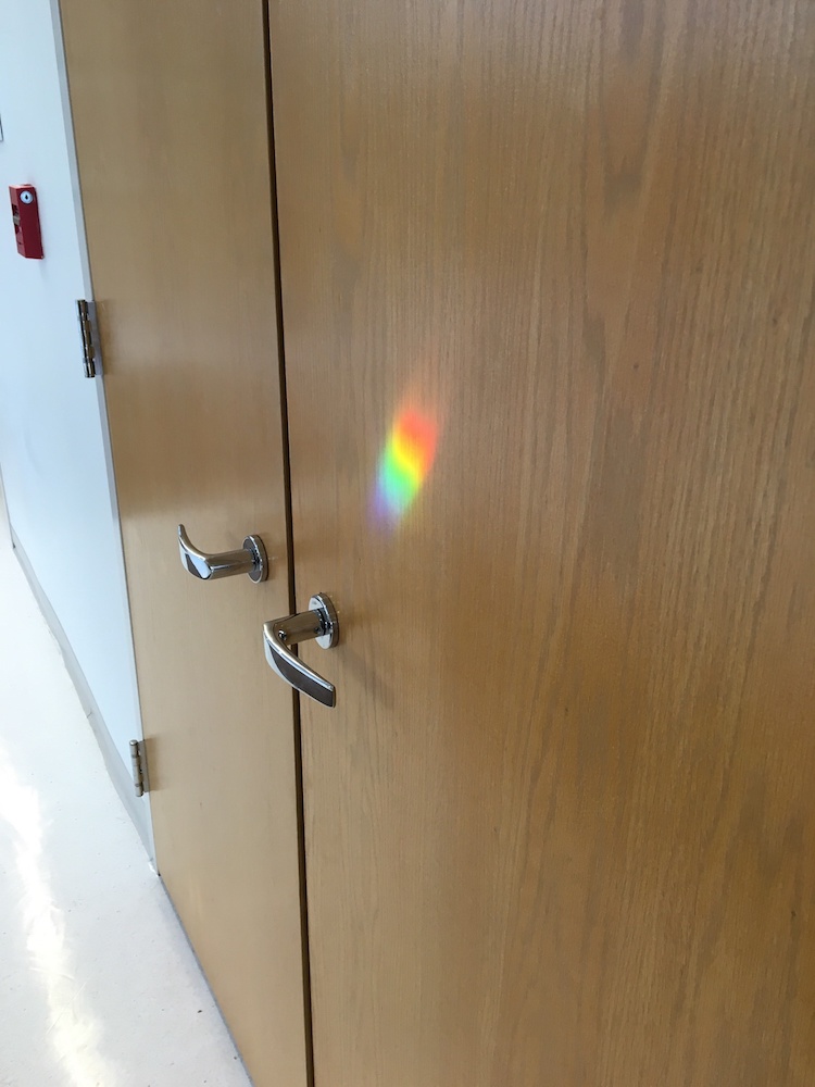A photograph of a natural prism of colored light.