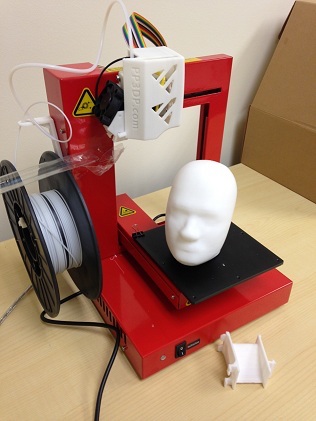3D printer with printed COMSOL models.