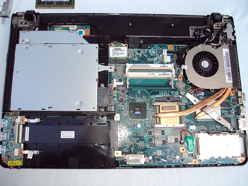 A photograph of the motherboard inside of a laptop computer.