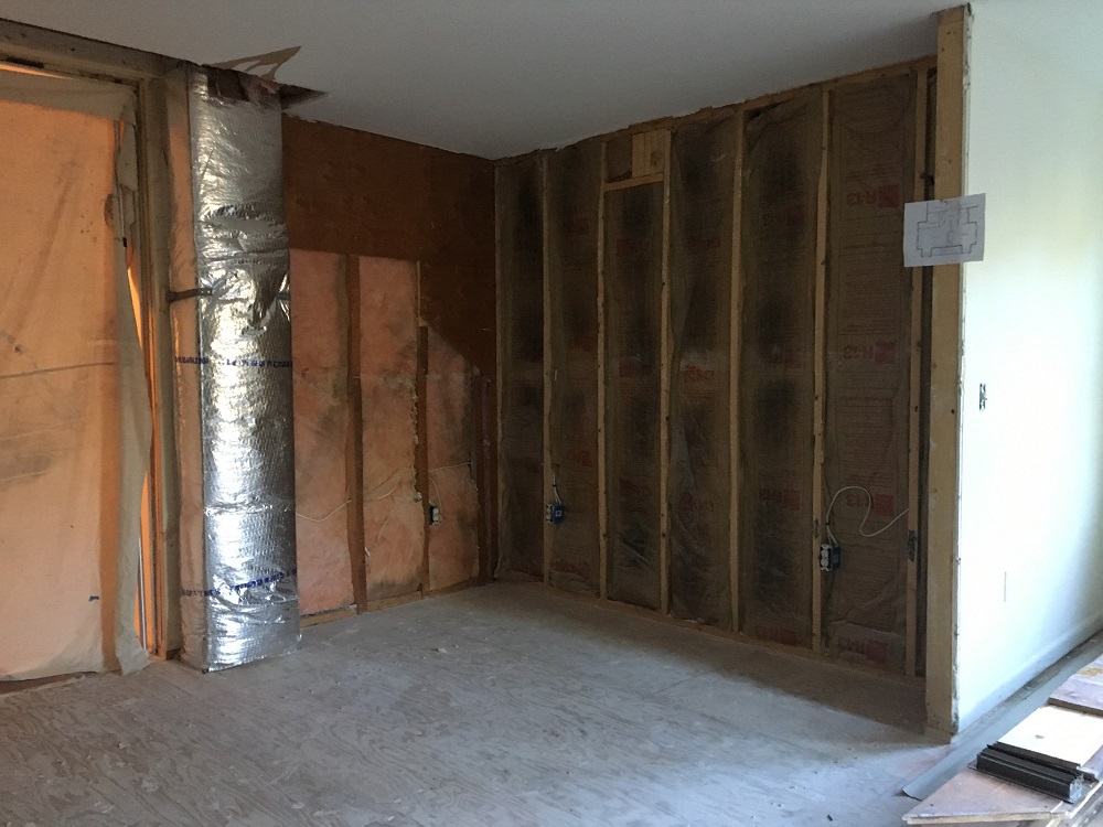 A photograph of insulation and ductwork that constitutes a passive fire protection system.