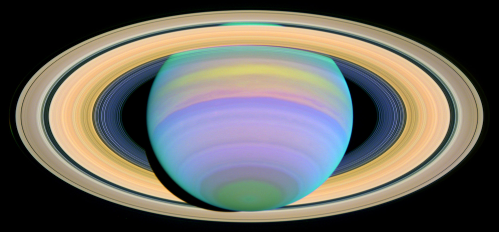 An image of Saturn and its rings in ultraviolet light.