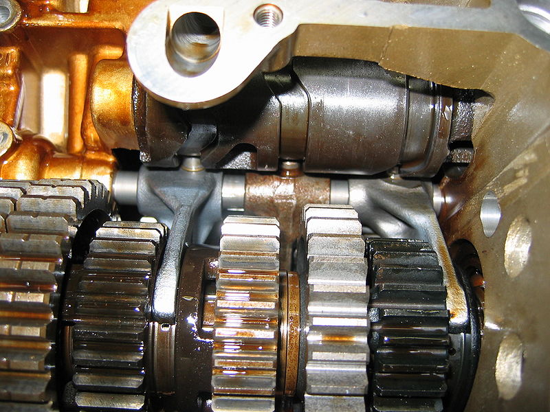 A photograph of a power transmission system with spur gears.