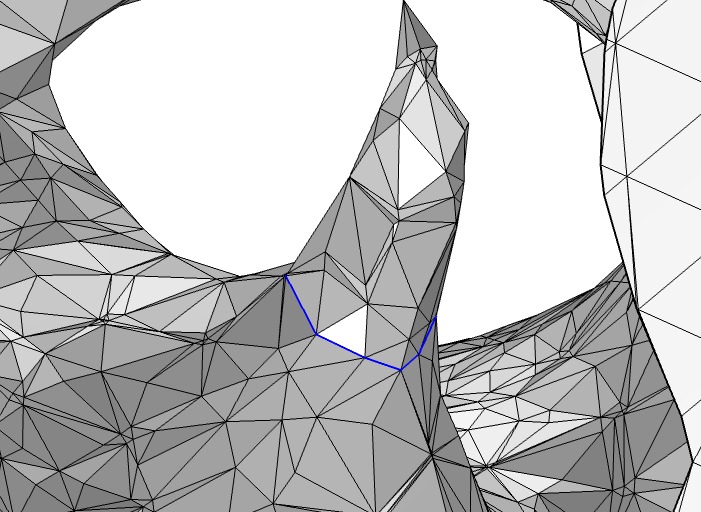 A close-up image of a meshed spike with each mesh edge selected and highlighted with blue lines.