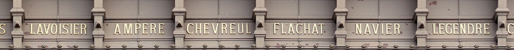 A photograph of six scientist names on the Eiffel Tower, including Lavoisier, Ampere, Chevreul, Flachat, Navier, and Legendre.