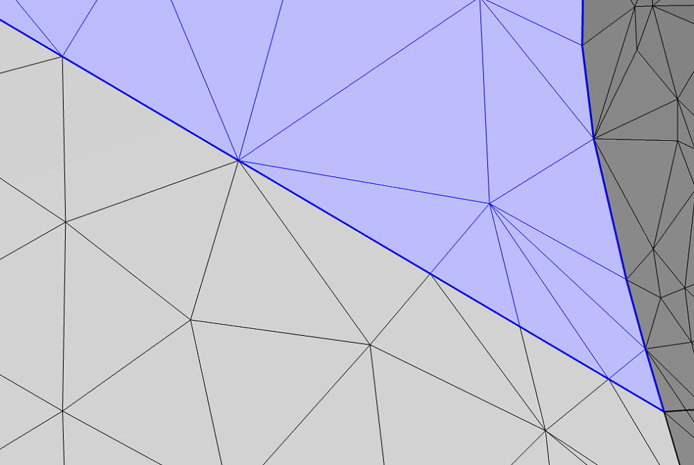 Увеличенное изображение сетки после выполнения операции Intersect with Plane, измененная область выделена синим цветом.
