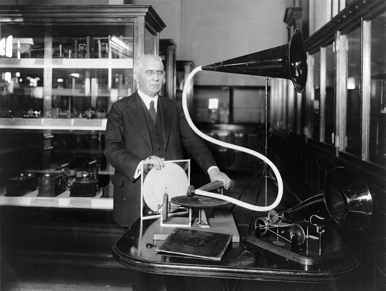 A black-and-white photograph of Emile Berliner with a gramophone.