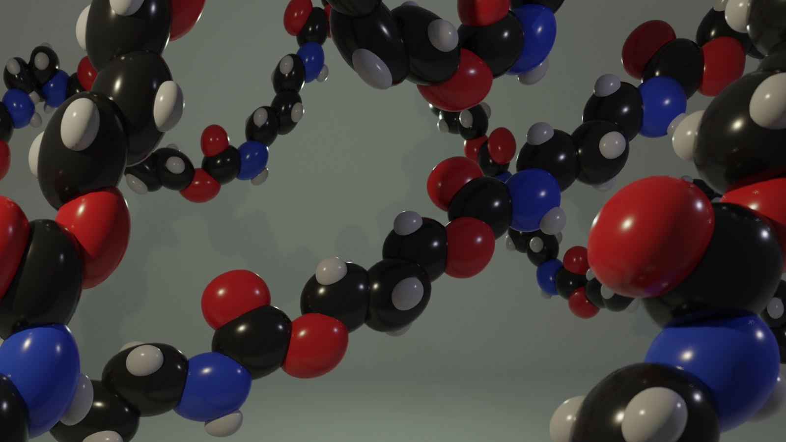An illustration of a chain of red, white, black, and blue polymer macromolecules.