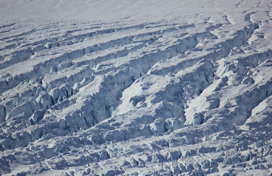 A close-up image of the crevasses in the Nioghalvfjerdsbræ glacier.