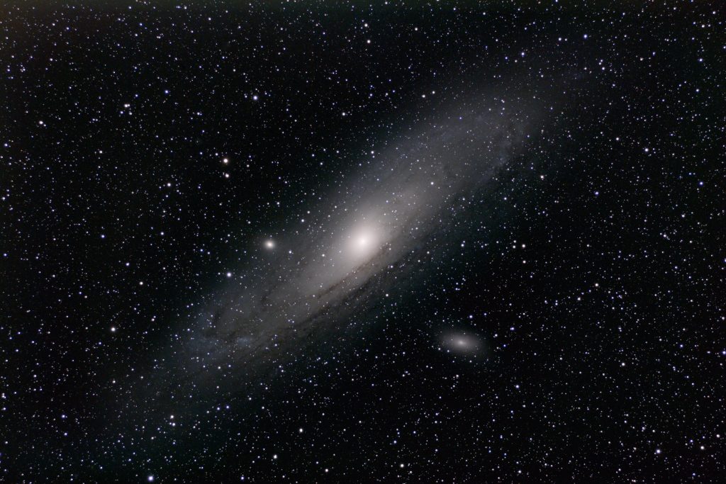 An image of the Andromeda Galaxy and its satellite galaxy, Messier 110.