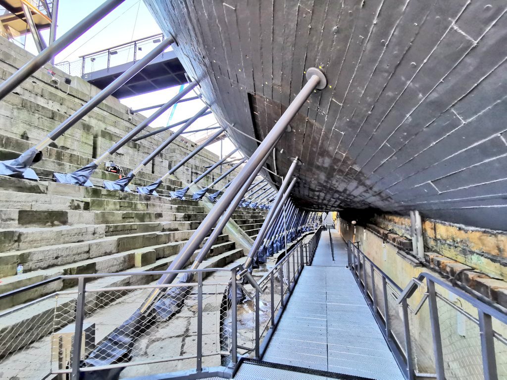 A close-up view of the walkway underneath the HMS Victory.