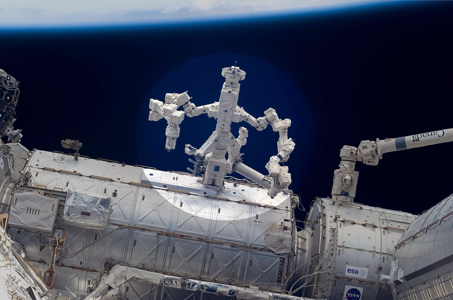 A photograph of the remote manipulator, Dextre, on the ISS.