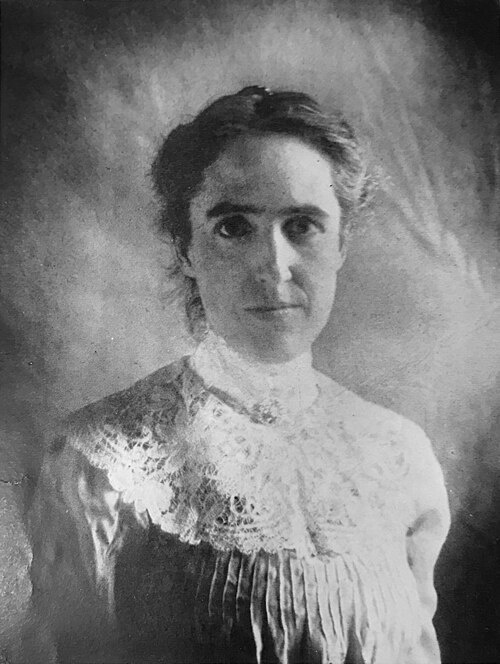 A black and white photograph of Henrietta Swan Leavitt.